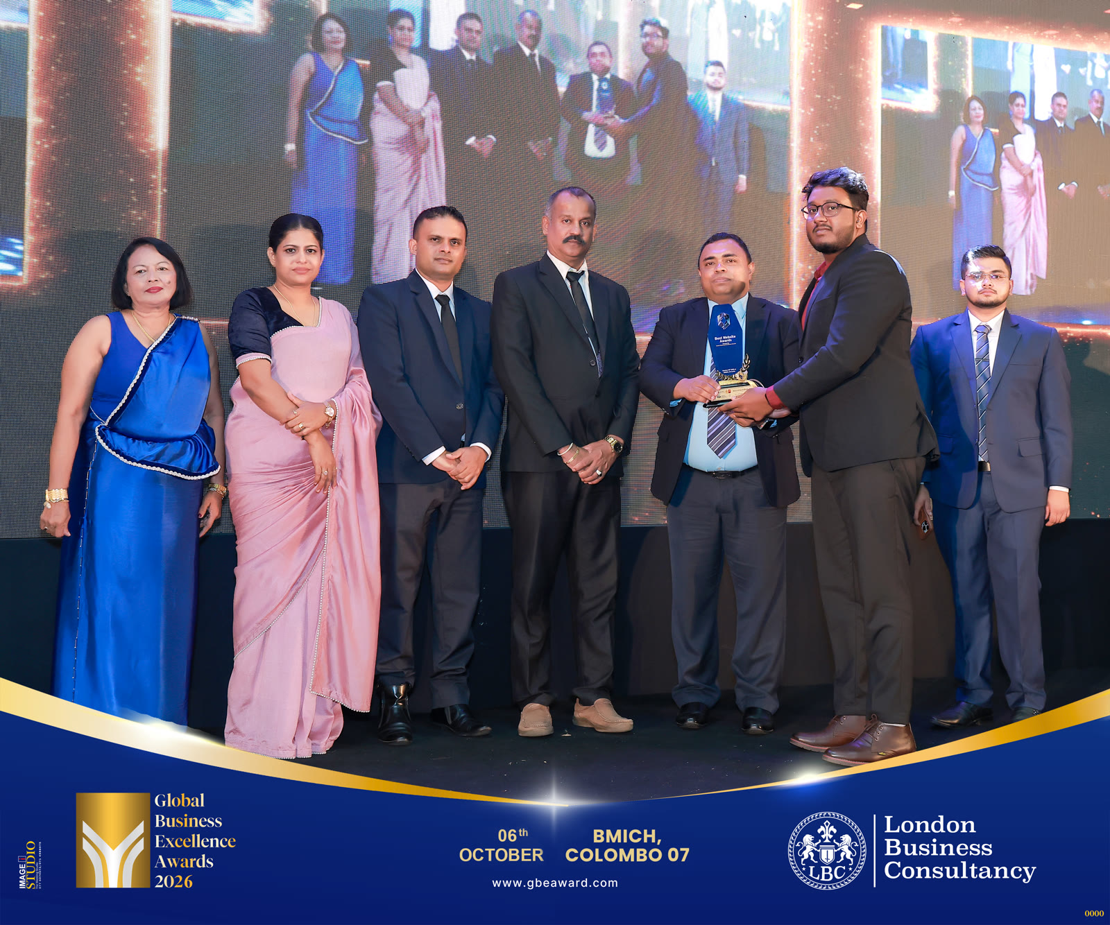 Accron Revolutions receiving the Best Software Solutions Website 2026 award on stage at the Global Business Excellence Awards 2026, BMICH Colombo
