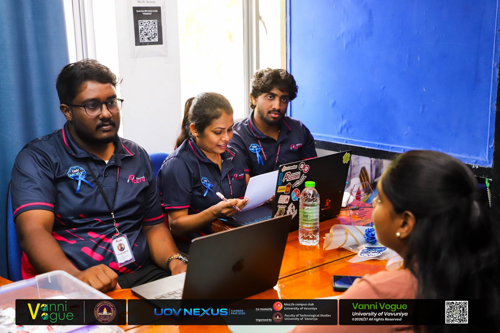 Accron engineers reviewing a student's CV and portfolio at the University of Vavuniya Career Fair 2026