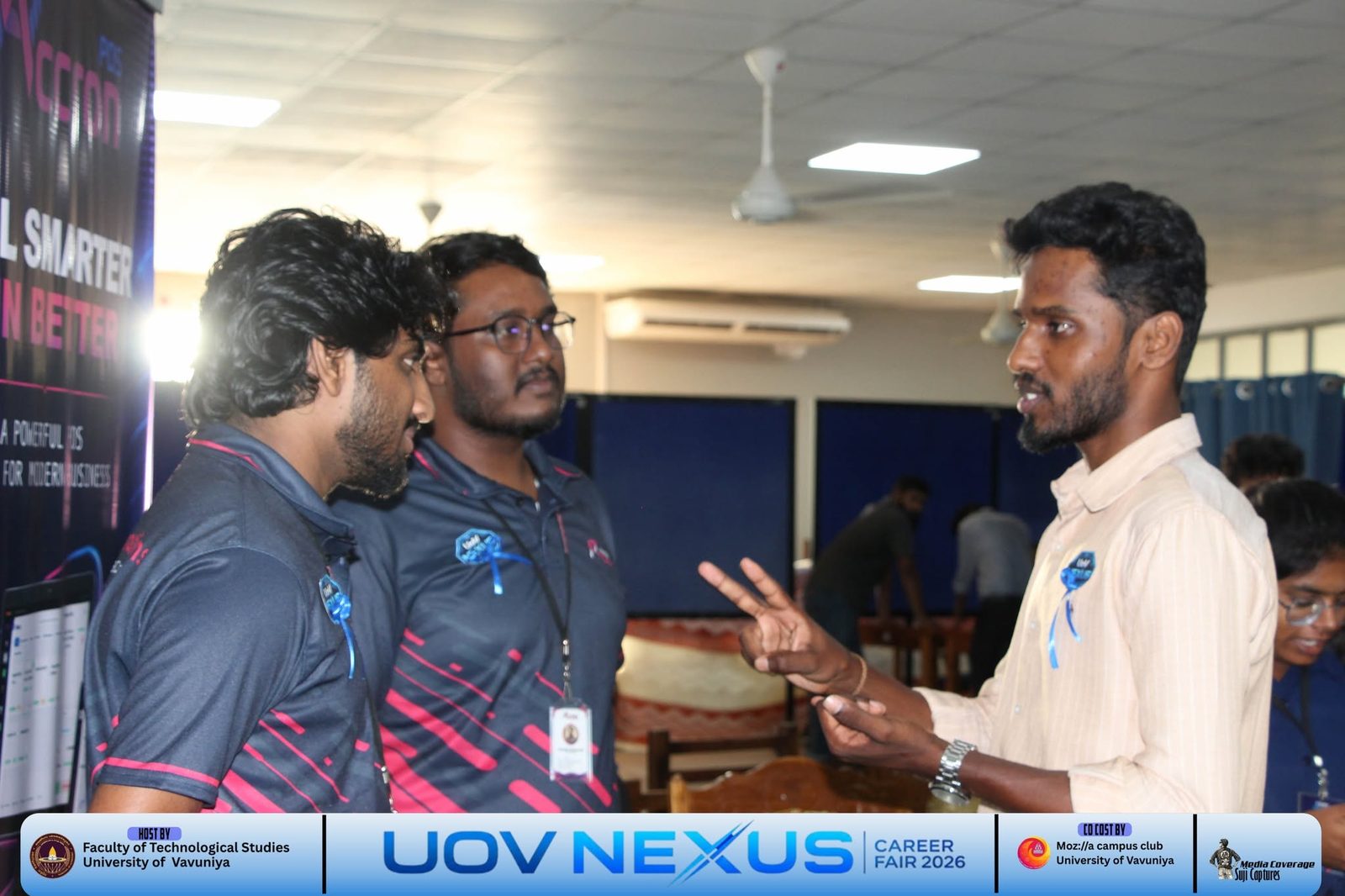 Accron Revolutions engineers talking with an IT student at the University of Vavuniya Career Fair 2026