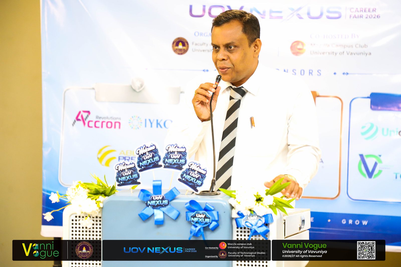 Faculty address at the UoV NEXUS Career Fair 2026 with Accron Revolutions listed among the sponsors